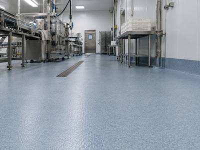 Seamless floor under a food packaging line in Central Alberta